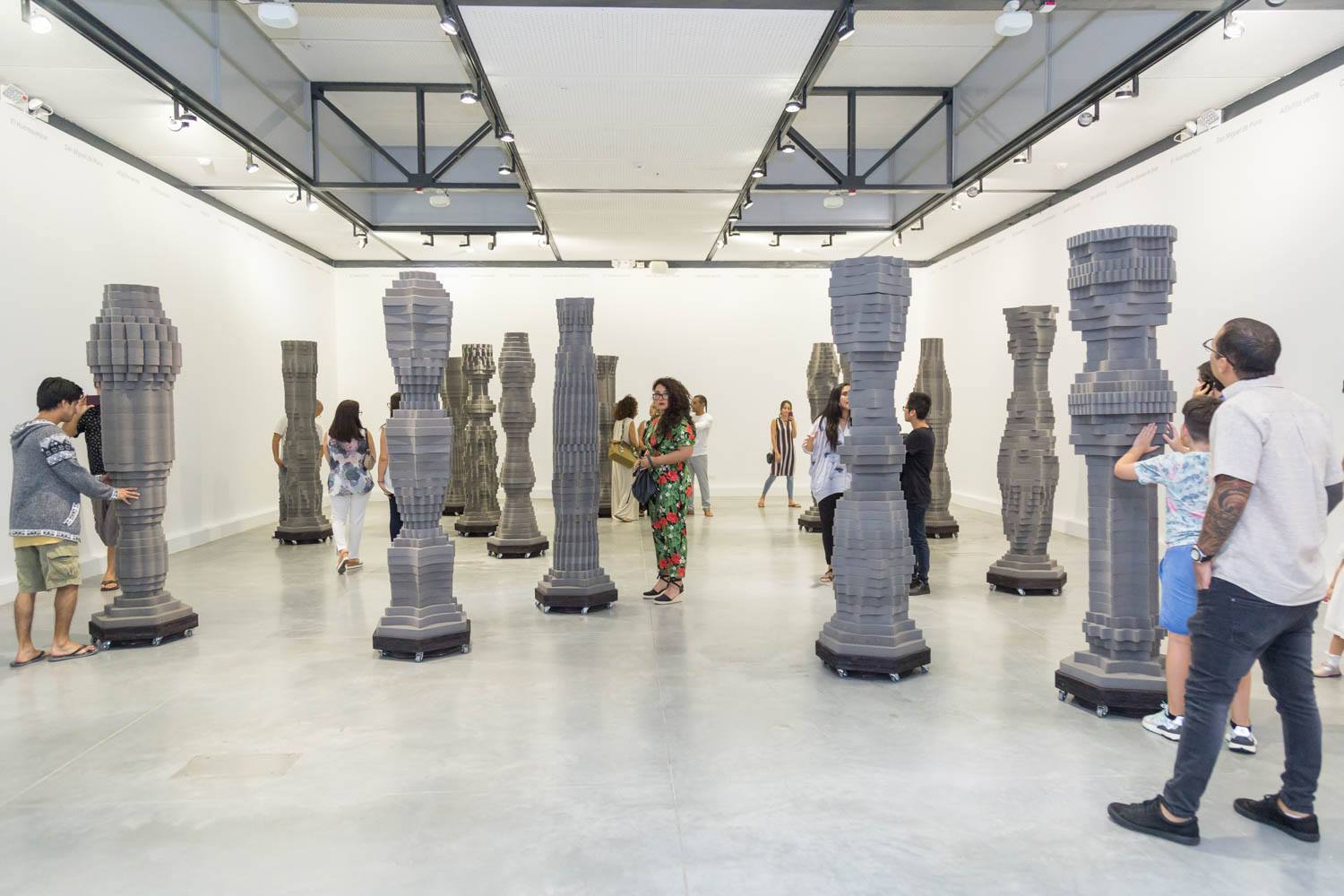 VERA Installation at MAC Lima - Visitors interacting with sculptures